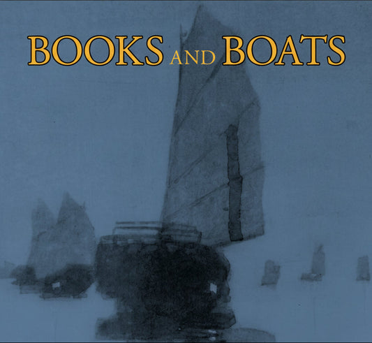 Book cover of 'Books and Boats' with a silhouette of a boat and mountains.